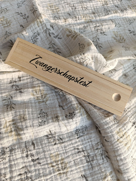 Houten doosje zwangerschaps- test